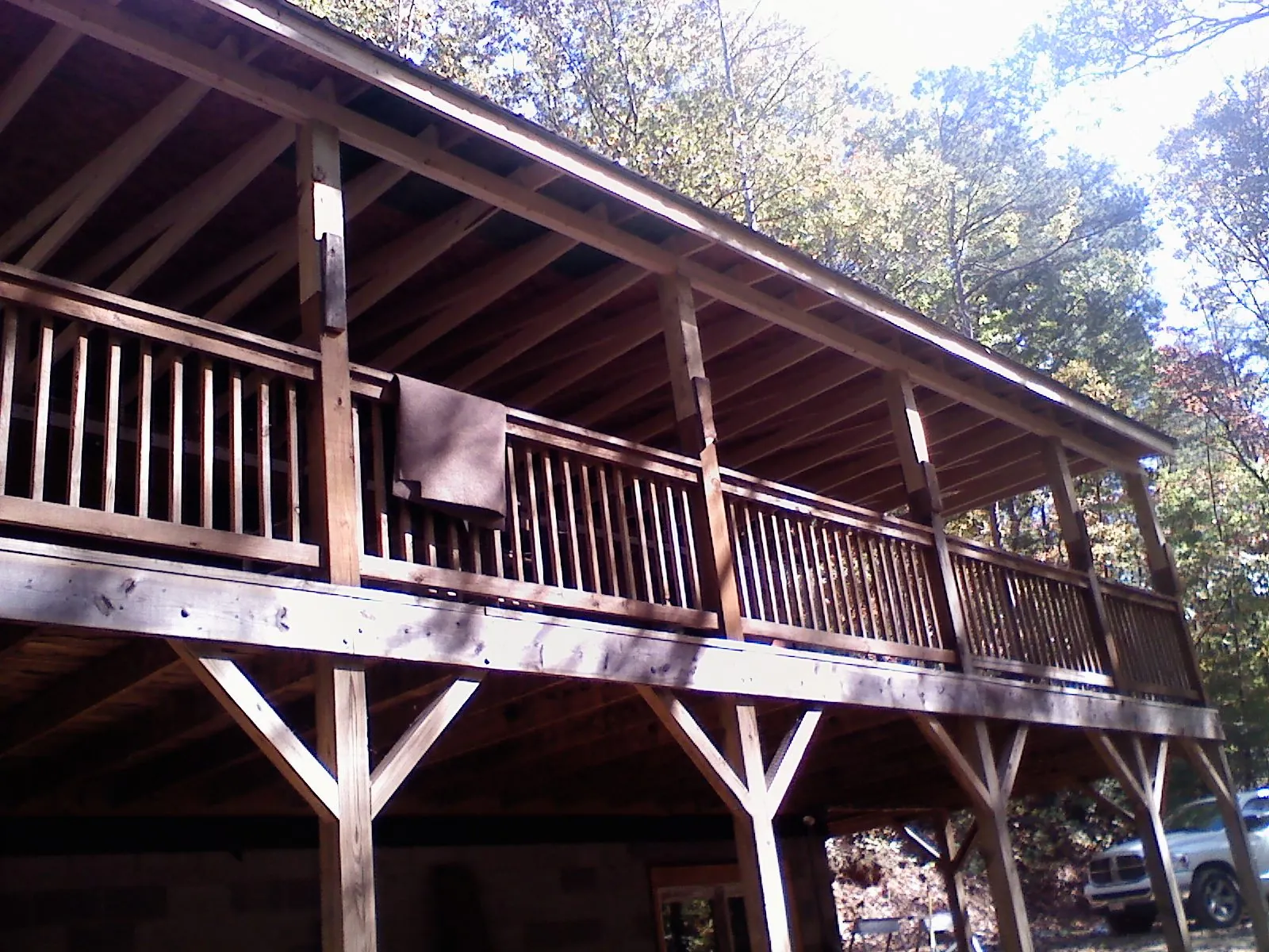 Timber framing under a new elevated porch and deck — Roof Leak Repair in Prospect Heights by Roofing Brothers